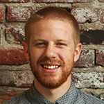profile picture of man with brick background